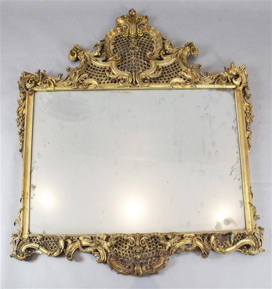 A late Victorian giltwood and gesso wall mirror, W.4ft 8in. H.5ft 1in.